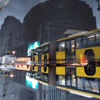 Berlin rainy street mirroring lights and colors