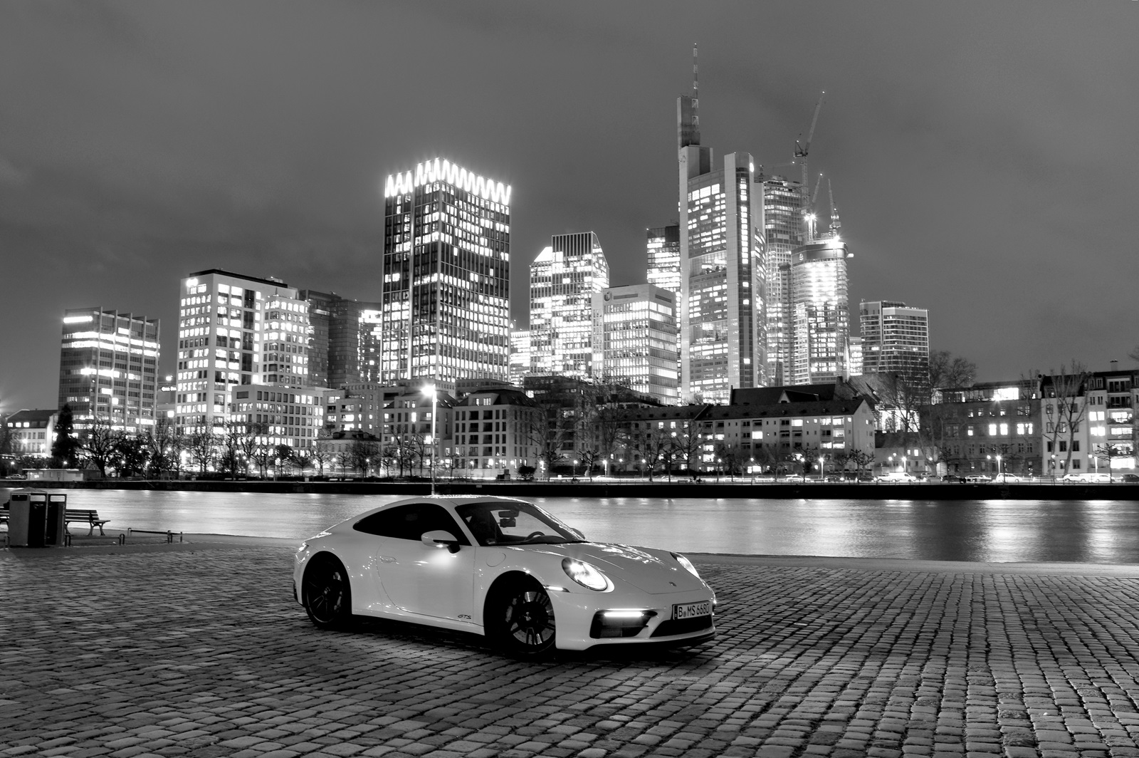 Porsche Carrera 911 992 4 GTS and the Skyline of Frankfurt am Main